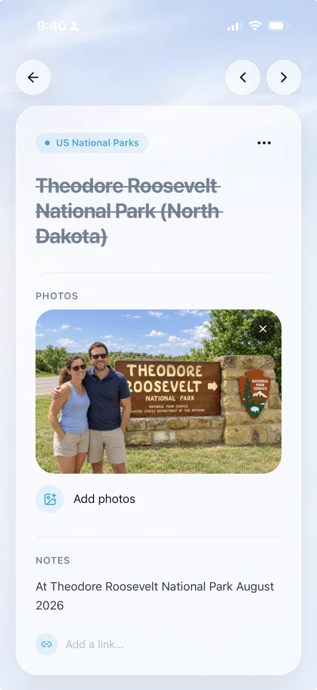Theodore Roosevelt National Park checked off in NellyList, with a photo of both partners at the park sign